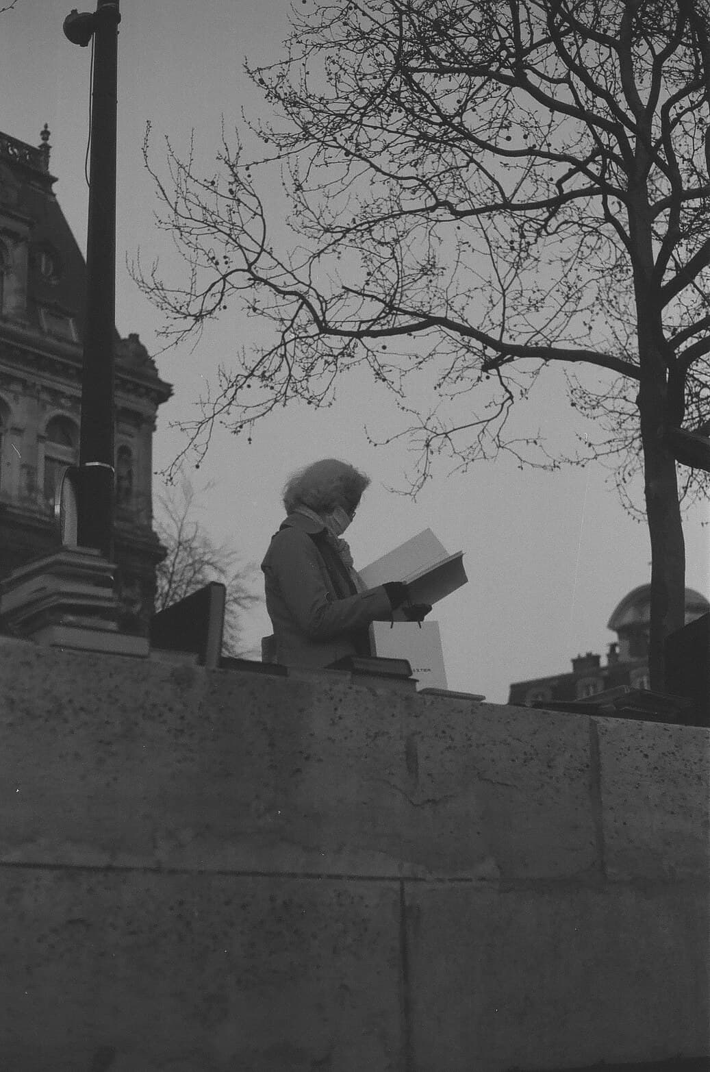 Barthelemy de Mazenod | People of Paris | Woman reading a book in the banks of the Seine