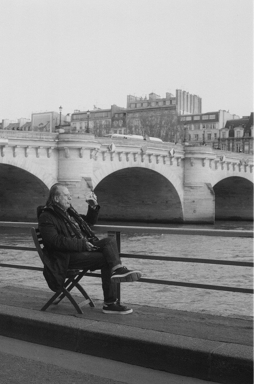Barthelemy de Mazenod | People of Paris | Man lost in thought and drinking a beer on the banks of the Seine