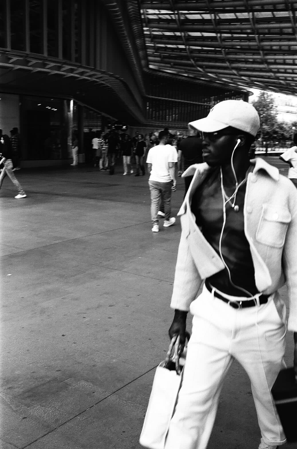 Barthelemy de Mazenod | People of Paris | A stylish man dressed all in white walking in Les Halles