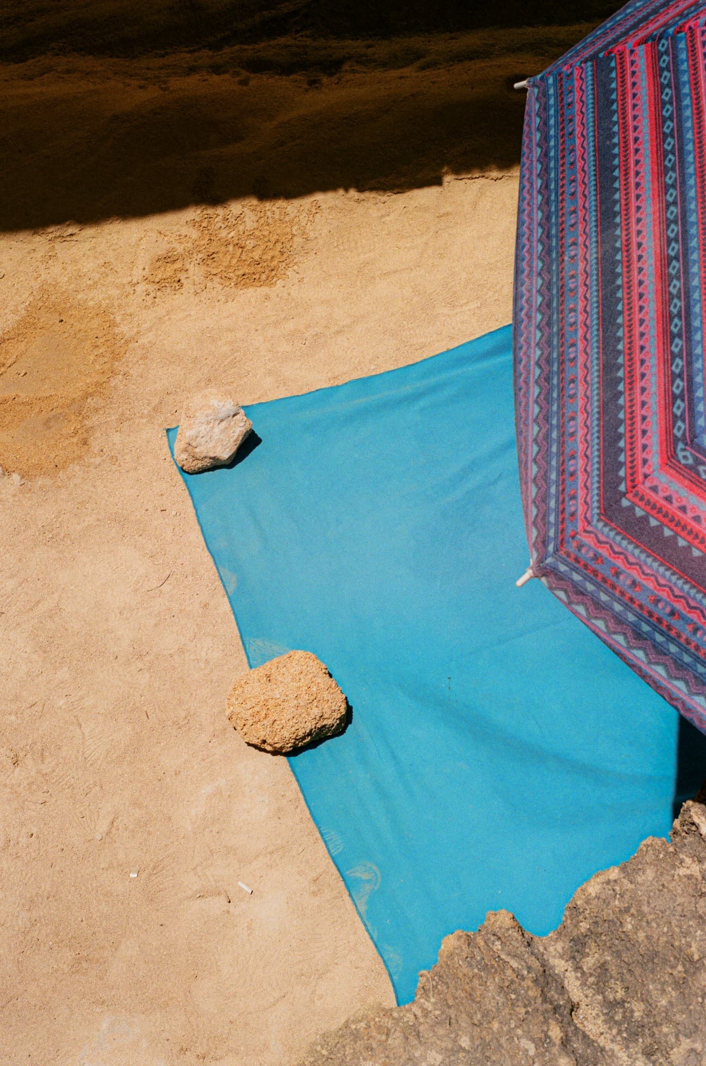 Barthelemy de Mazenod | The Seafront | A towel on the sand in Favignana, Sicily